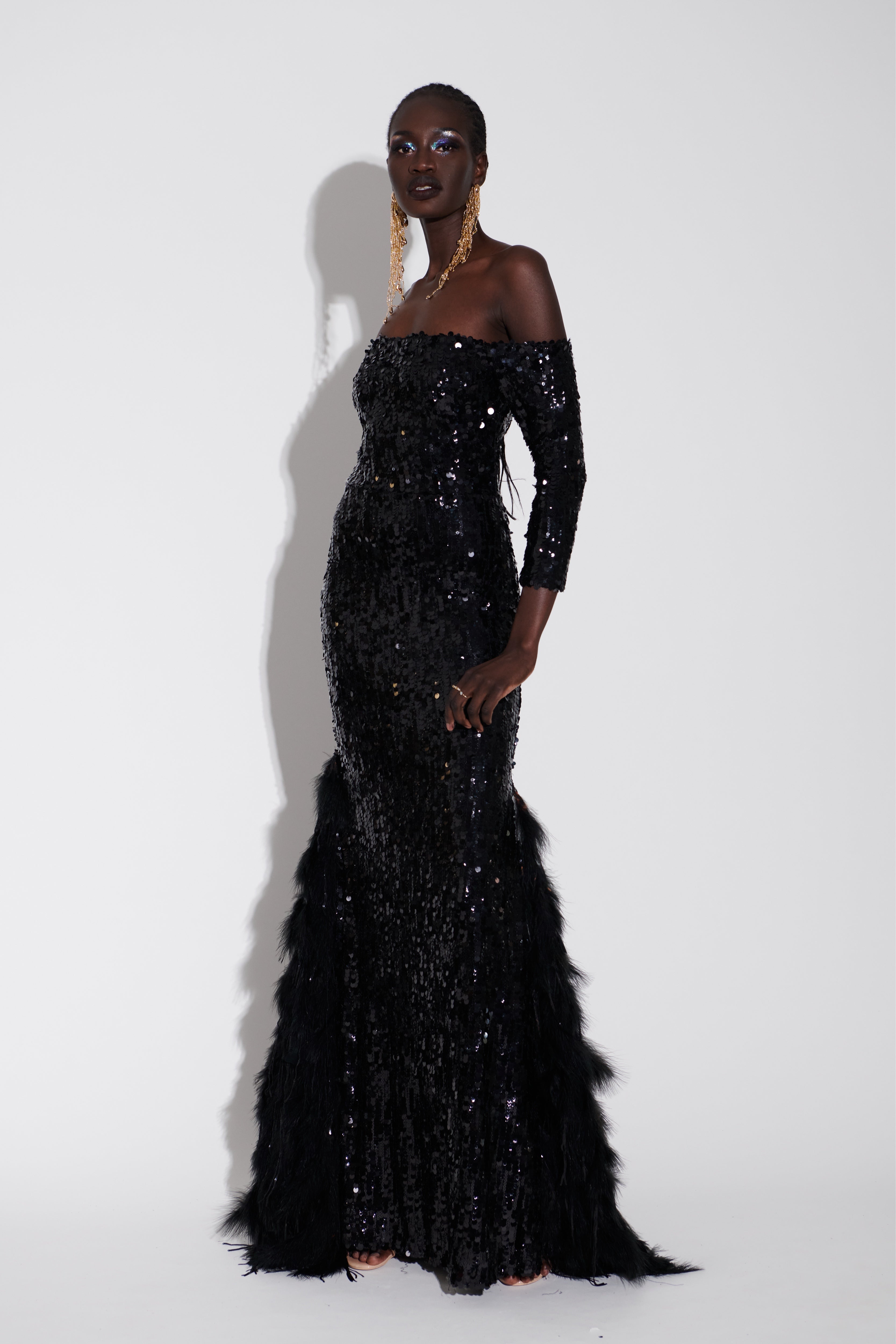 FEATHERED BLACK SEQUIN GOWN