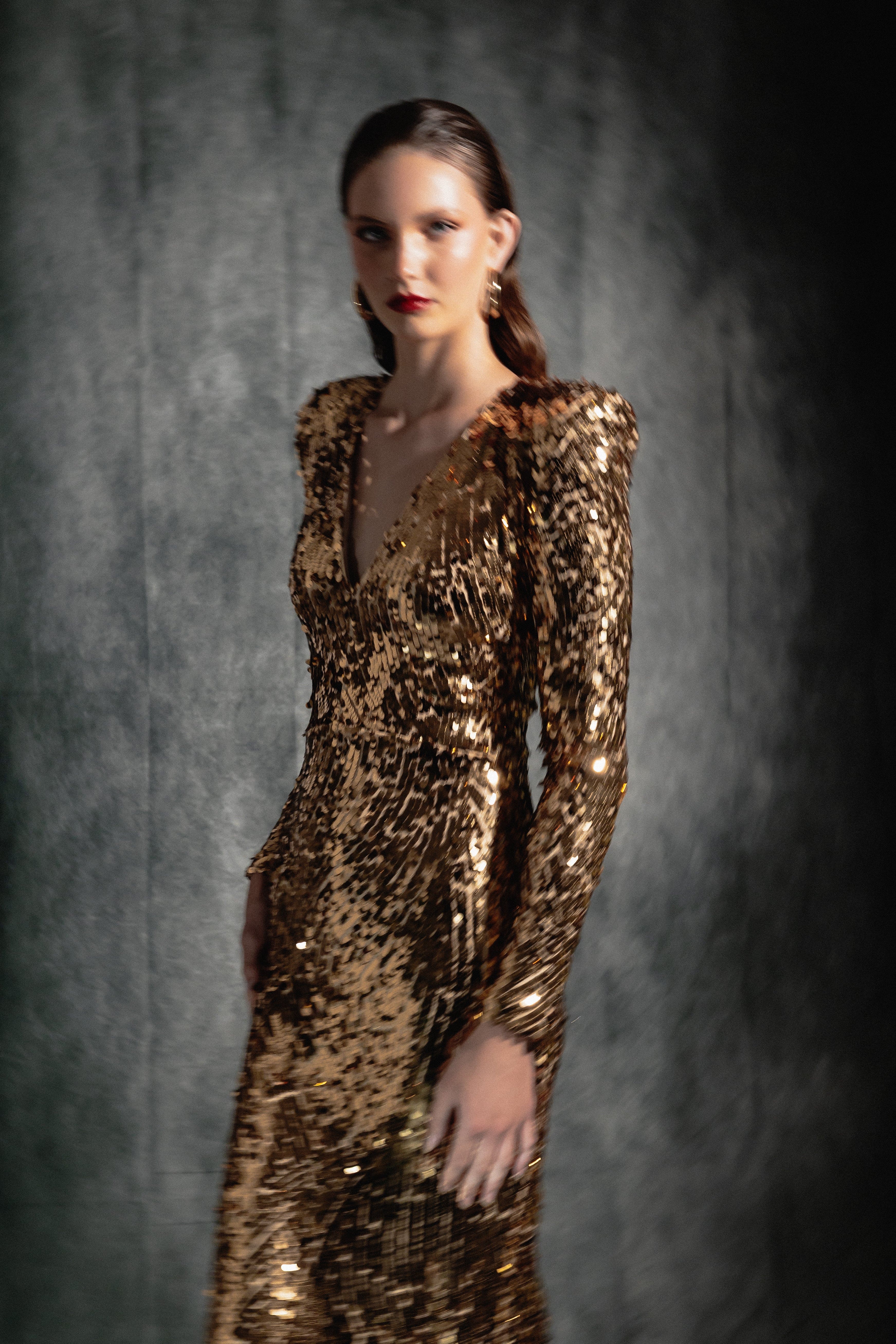 GOLD SEQUIN VNECK GOWN